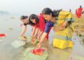 পাহাড়ে পানিতে ফুল ভাসিয়ে বিজু উৎসব